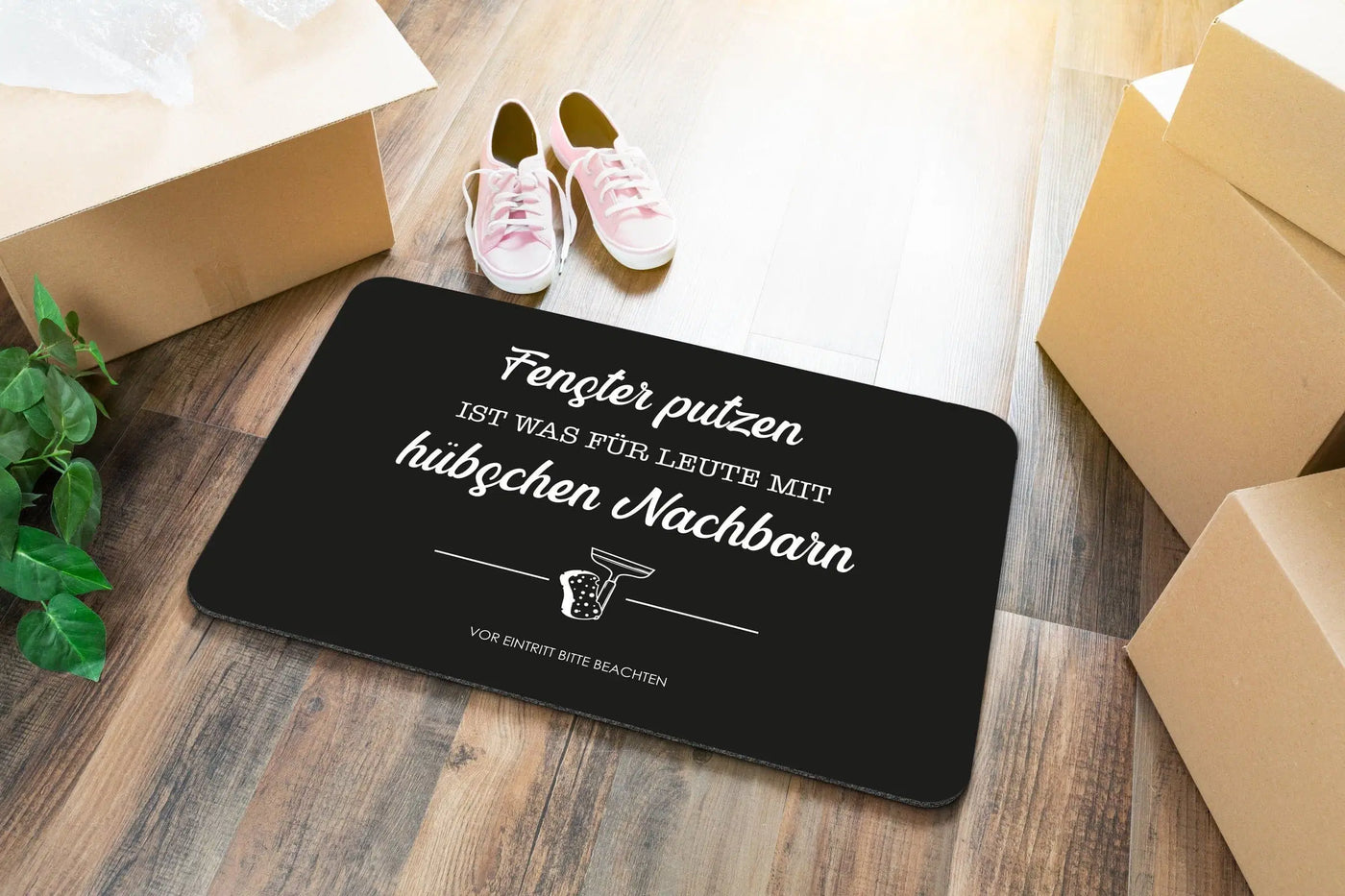 Bild: Fußmatte - Fenster putzen ist was für Leute mit hübschen Nachbarn. Geschenkidee