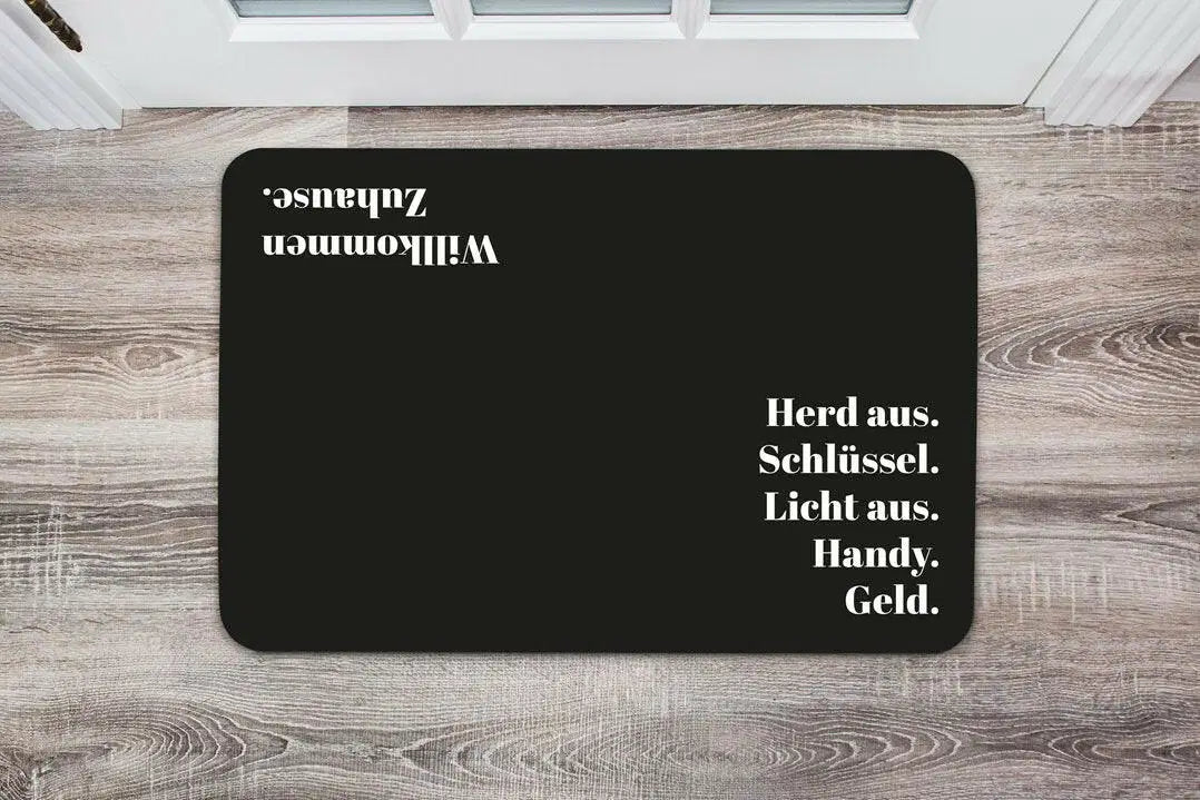 Bild: Fußmatte - Herd aus. Schlüssel. Licht aus. Handy. Geld. Geschenkidee