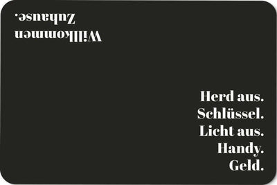 Bild: Fußmatte - Herd aus. Schlüssel. Licht aus. Handy. Geld. Geschenkidee