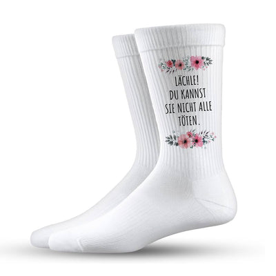 Socken - Lächle! Du kannst sie nicht alle töten. - blumig