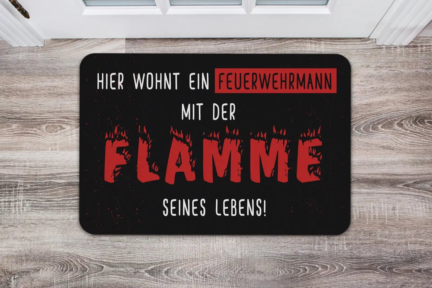 Bild: Fußmatte - Hier wohnt ein Feuerwehrmann mit der Flamme seines Lebens Geschenkidee