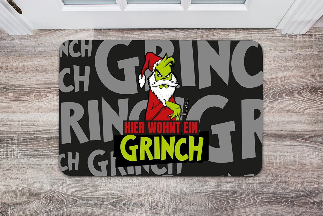 Bild: Fußmatte - Hier wohnt ein Grinch Geschenkidee