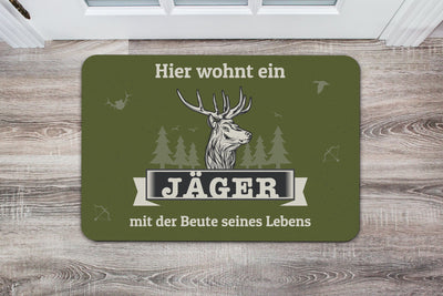 Bild: Fußmatte - Hier wohnt ein Jäger mit der Beute seines Lebens Geschenkidee