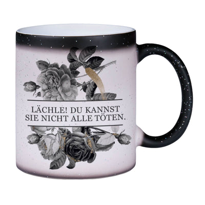 Bild: Glitzer-Zaubertasse - Lächle! Du kannst sie nicht alle töten. - Black Rose Geschenkidee