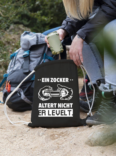 Bild: Turnbeutel - Ein Zocker altert nicht er levelt. - V2 Geschenkidee